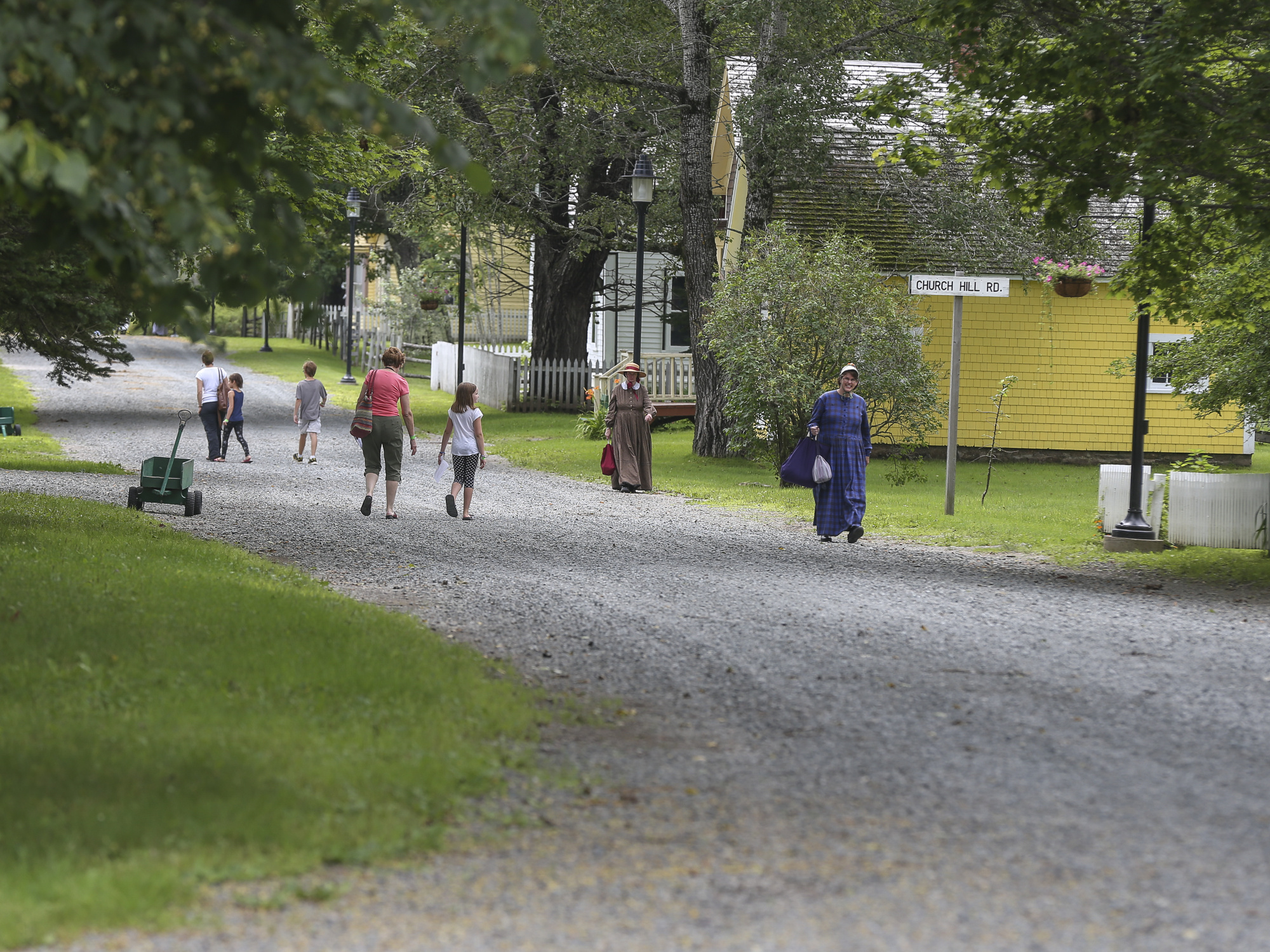 Visitor touring Sherbrooke Village.