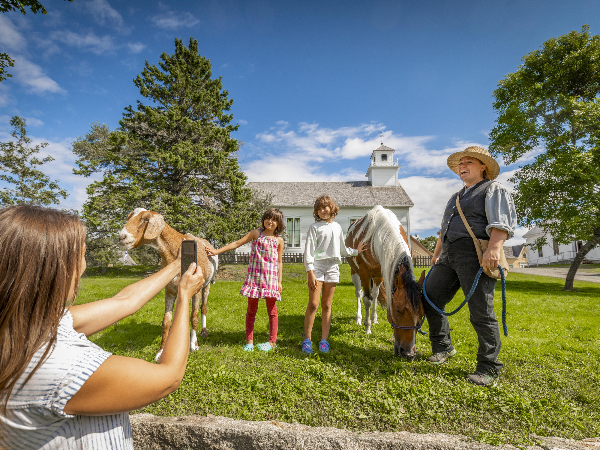 Family taking a photos at Sherbrooke Village.