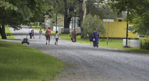 Visitor touring Sherbrooke Village.
